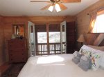 King Bed upstairs with Private Balcony and Long Range River View
